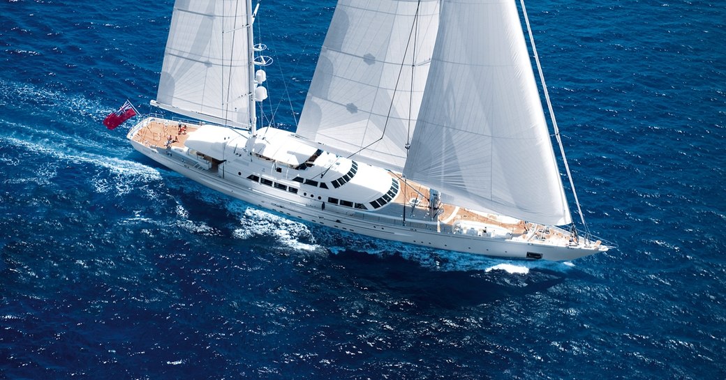 Running shot of large ketch yacht for charter