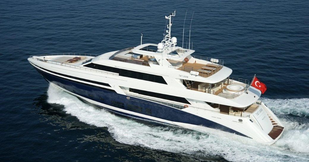 Charter yacht TATIANA I underway, surrounded by sea