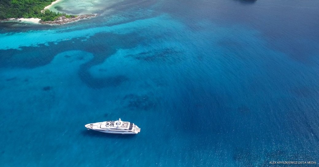 aerial view of luxury yacht silver angel against blue sea