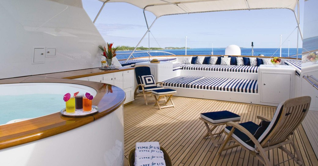 Luxury yacht sundeck on M/Y BROADWATER with jacuzzi pool and sun loungers