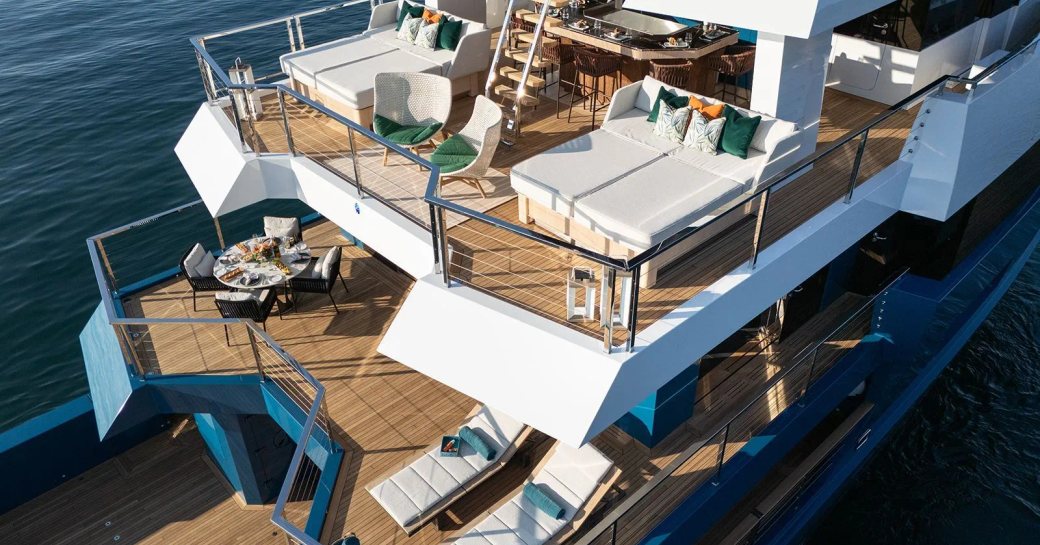 Overview looking down on exterior decks of charter yacht KING BENJI