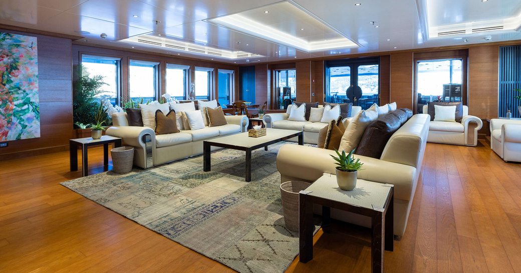 Main salon and plush lounge seating onboard charter yacht BOADICEA