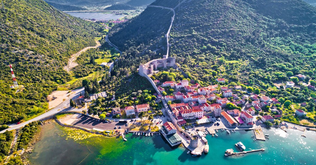 croatian coastlines with yachts in the water