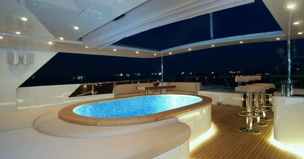 The Jacuzzi and bar featured on board motor yacht TATIANA 