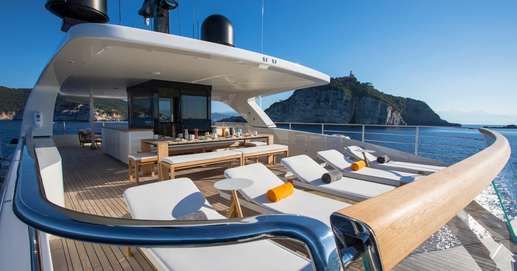 Sundeck overview with loungers onboard charter yacht MOKA