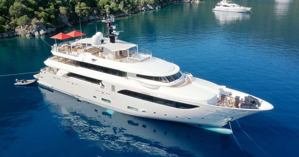 Charter yacht POLARIS at anchor in a bay