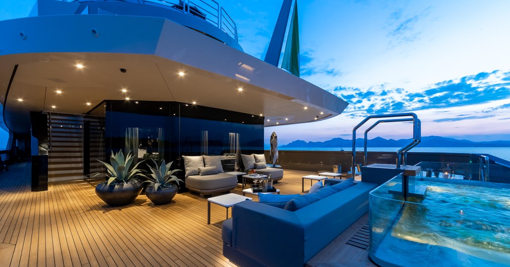 swimming pool and lounge area on the aft deck of luxury yacht SOLO 