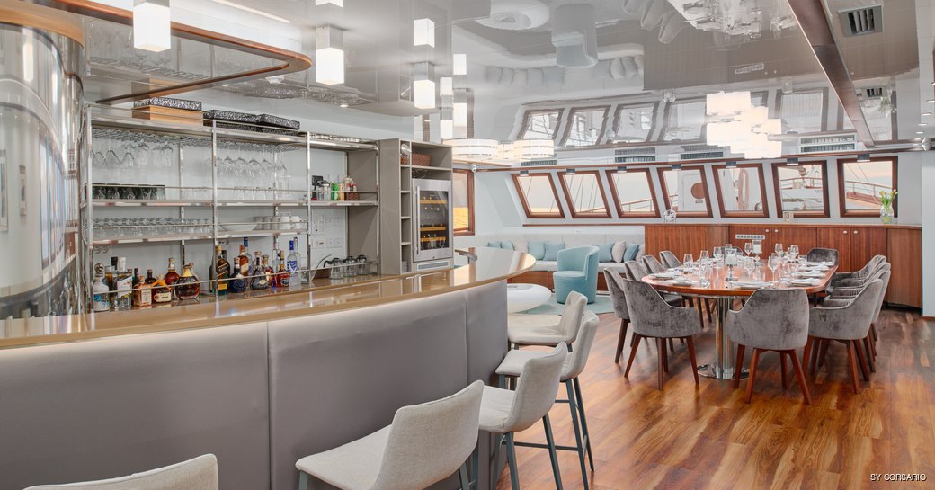 Bar and formal dining area onboard SY Corsario