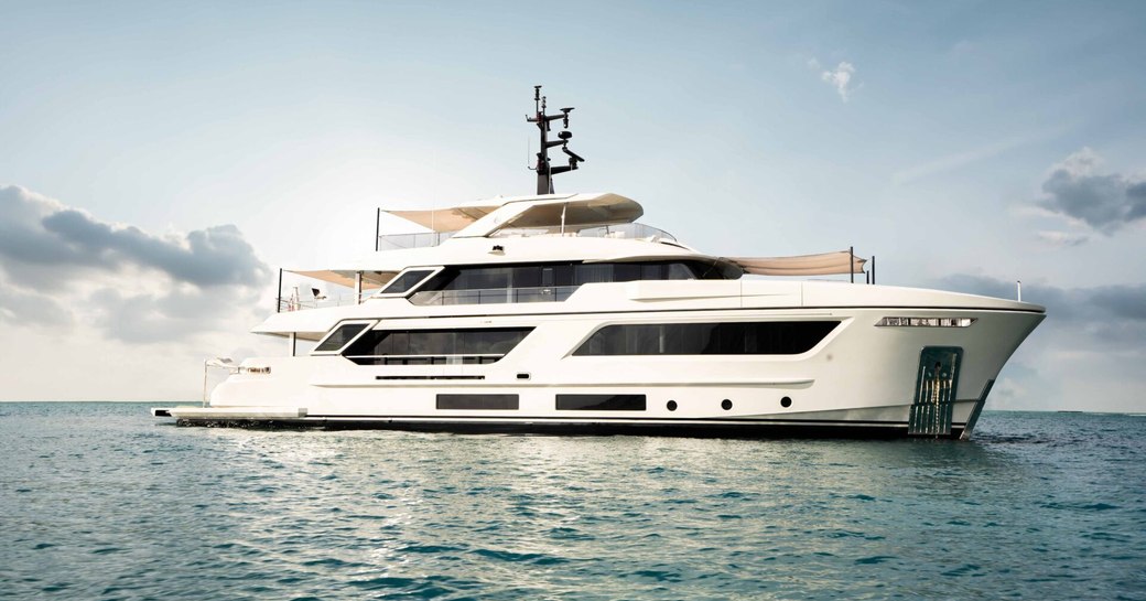 Charter yacht STELLAMAR at anchor, surrounded by sea