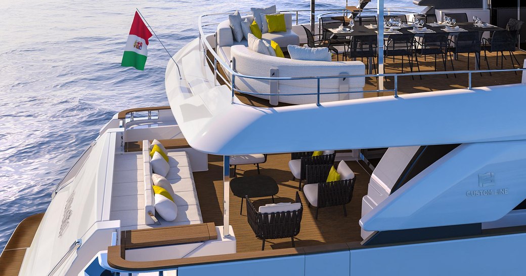 view of main deck aft and upper deck aft with seating and dining options on board charter yacht December Six 