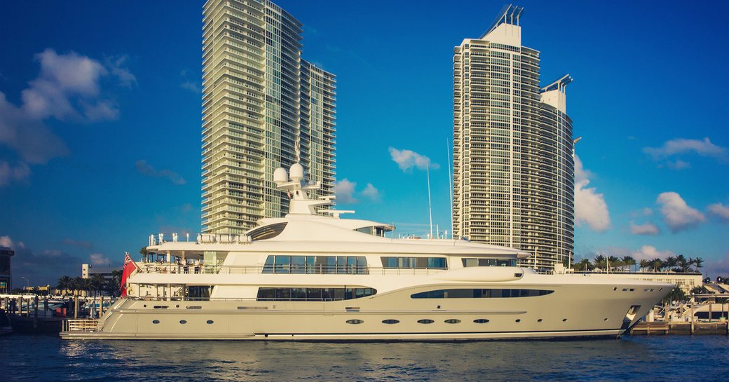 A motor yacht charter in front of Miami skyline