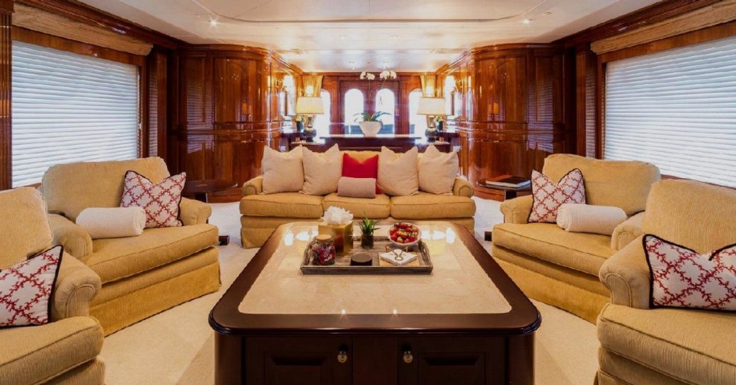 sumptuous seating in the main salon of superyacht One More Toy 