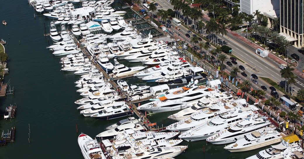 aerial view of yachts lined up at the Miami Yacht Show @ Collins Avenue