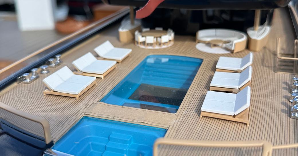 Close up of a swimming pool on a model of superyacht charter BREAKTHROUGH