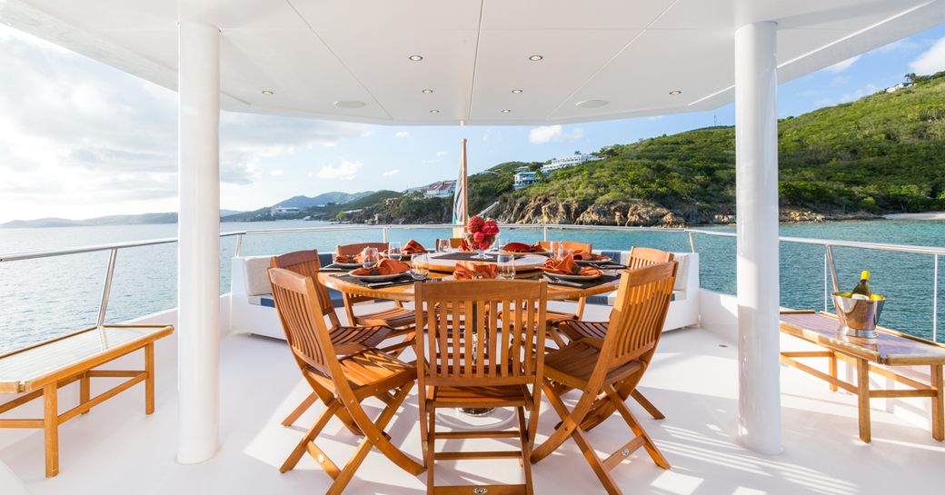 alfresco dining on upper deck of superyacht ‘Sea Falcon’ 