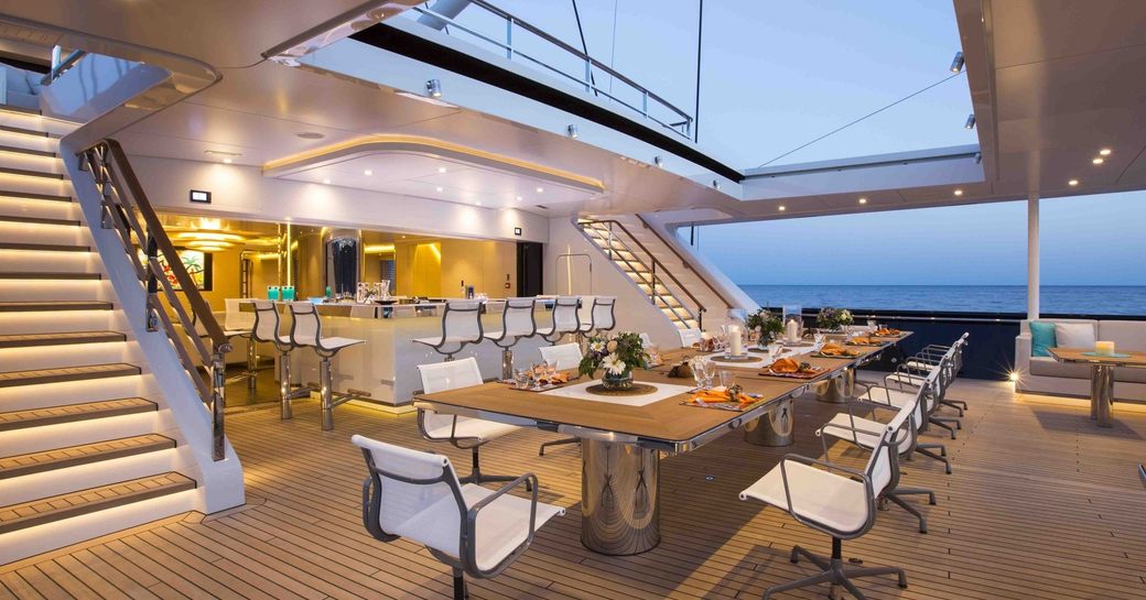 alfresco dining on the aft deck of superyacht AQUIJO 