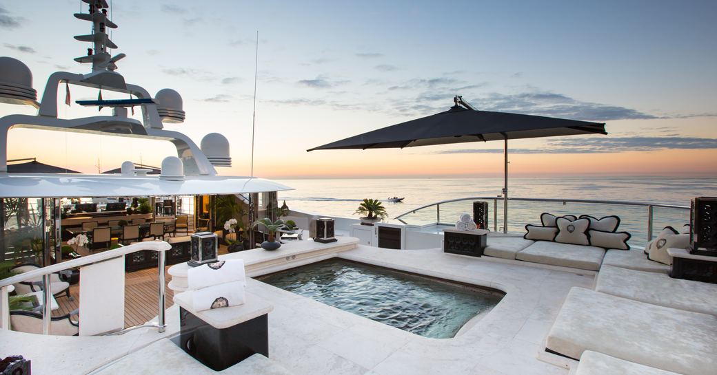 elevated pool on board superyacht ‘Lioness V’ at dusk