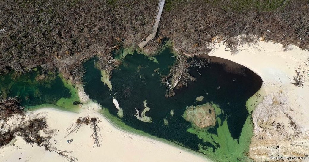 Aerial shot of Lucayan National Park's waters and surrounding sand 