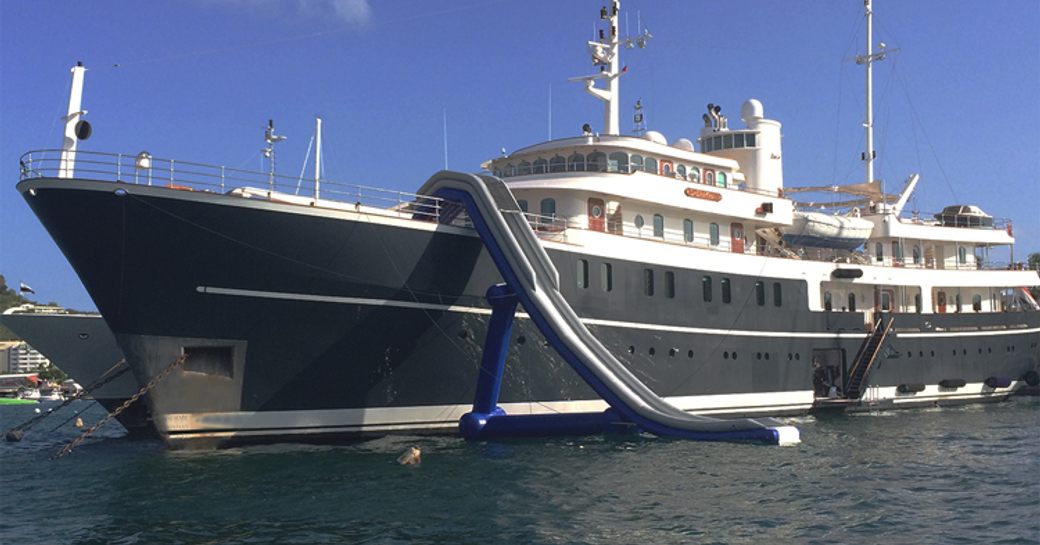 Motor yacht SHERAKHAN with an inflatable slide attached to its sundeck