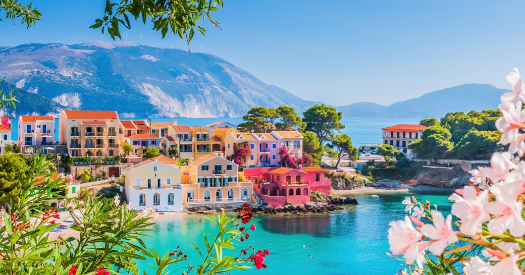 Gorgeous view in Kefalonia greece revealing blue waters, flowers and glorious sunshine 