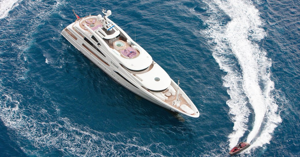 Benetti luxury motor yacht St David aerial shot, with tender alongside