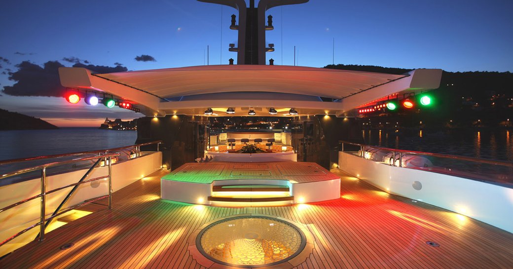 Sundeck on luxury yacht St David, with coloured lights creating a party atmosphere