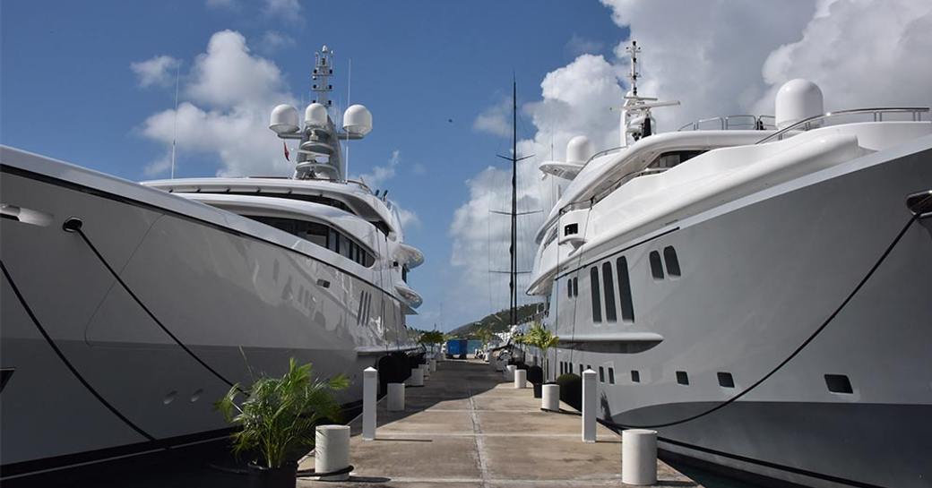 Two superyachts berthed at the Antigua Charter Yacht Show.