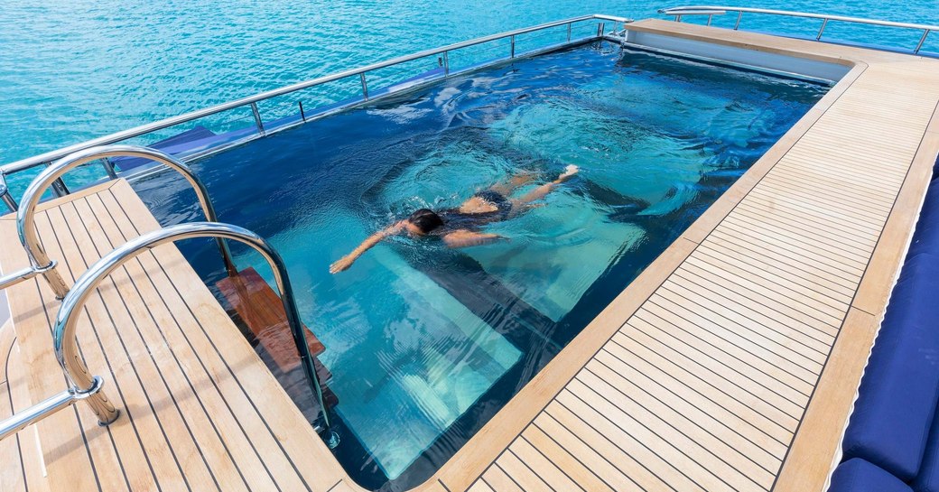 infinity pool with glass bottom onboard luxury superyacht B2