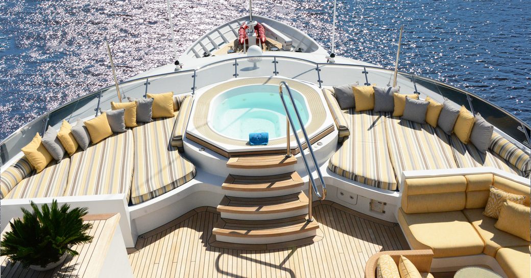 Overhead view of Jacuzzi and surrounding sun pads on sundeck of superyacht ‘Lady Sheridan’
