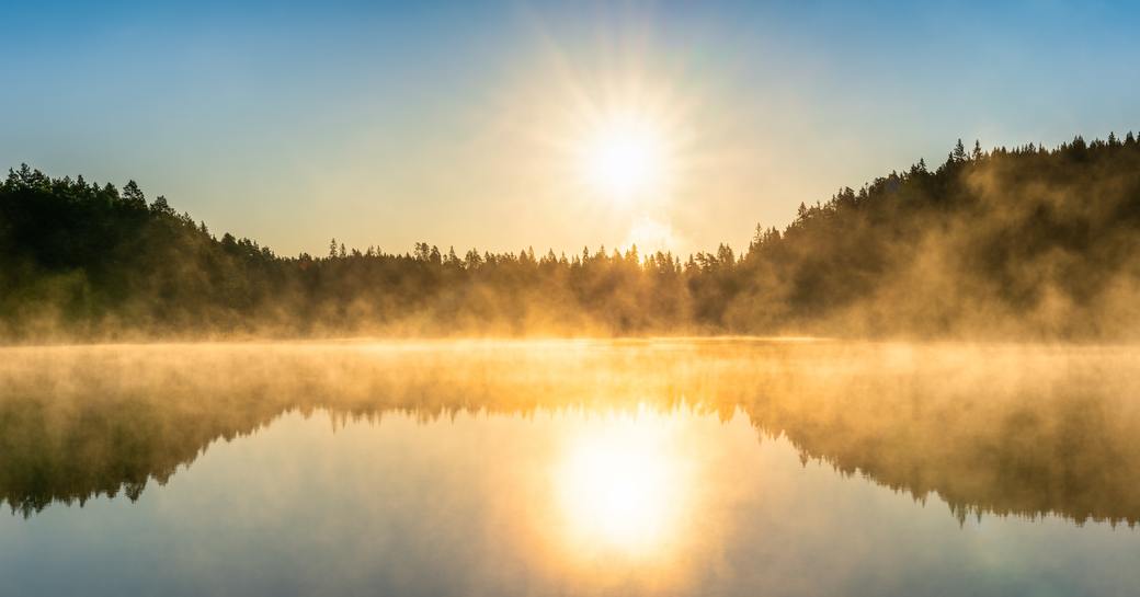 Sun rise over a lake in Sweden