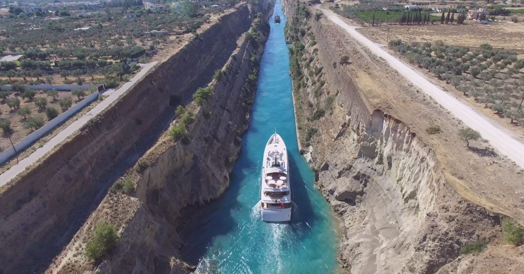 An aerial image of motor yacht St David making a passage through the Corinth Canal