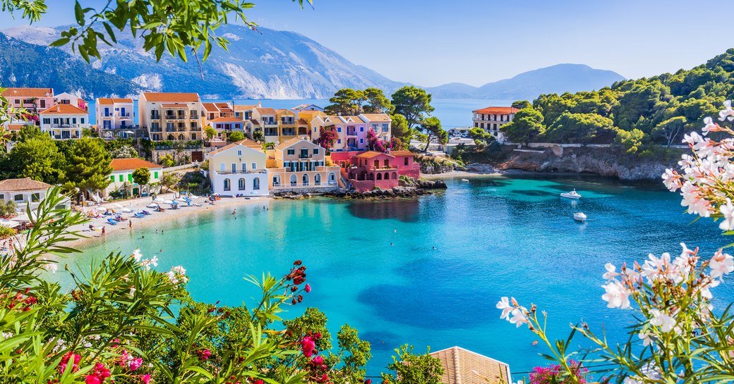 blue waters and colourful buildings in the Mediterranean