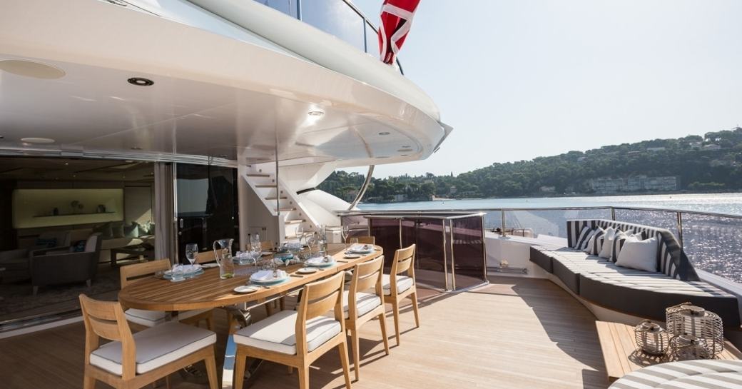 alfresco dining on aft deck of charter yacht THUMPER 