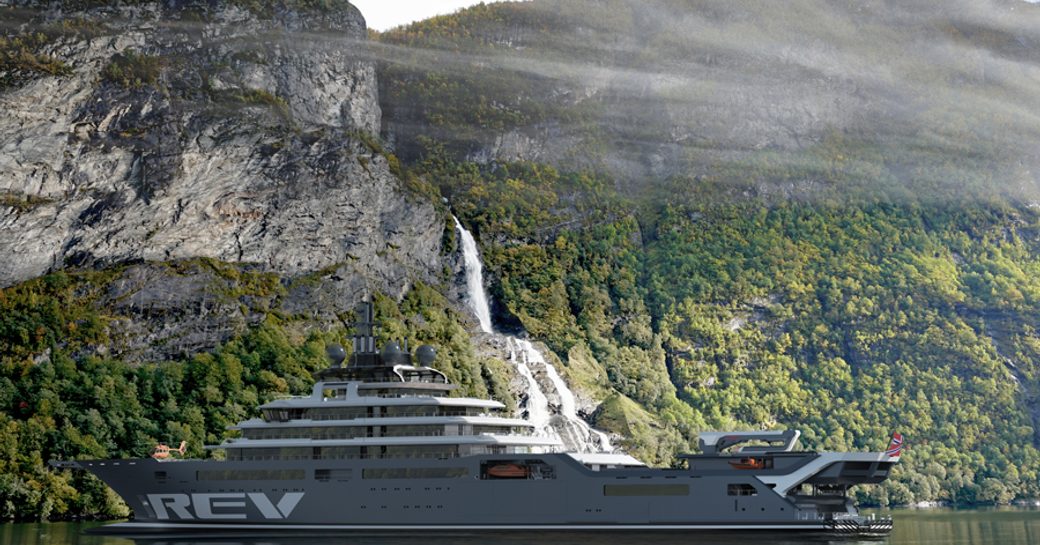 Superyacht REV with fjords of Norway in background