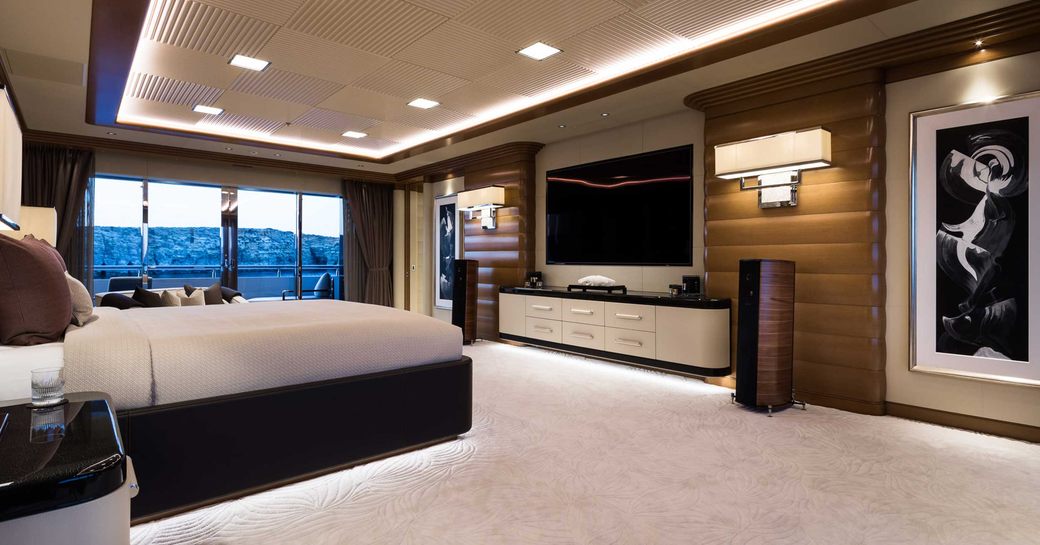 master cabin on megayacht lana, with sea terrace and tv screen