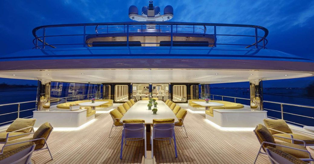 spacious upper deck aft with alfresco dining area and further seating