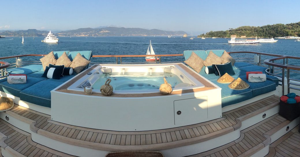 Jacuzzi and sun pads on sundeck of motor yacht 'Cocoa Bean'