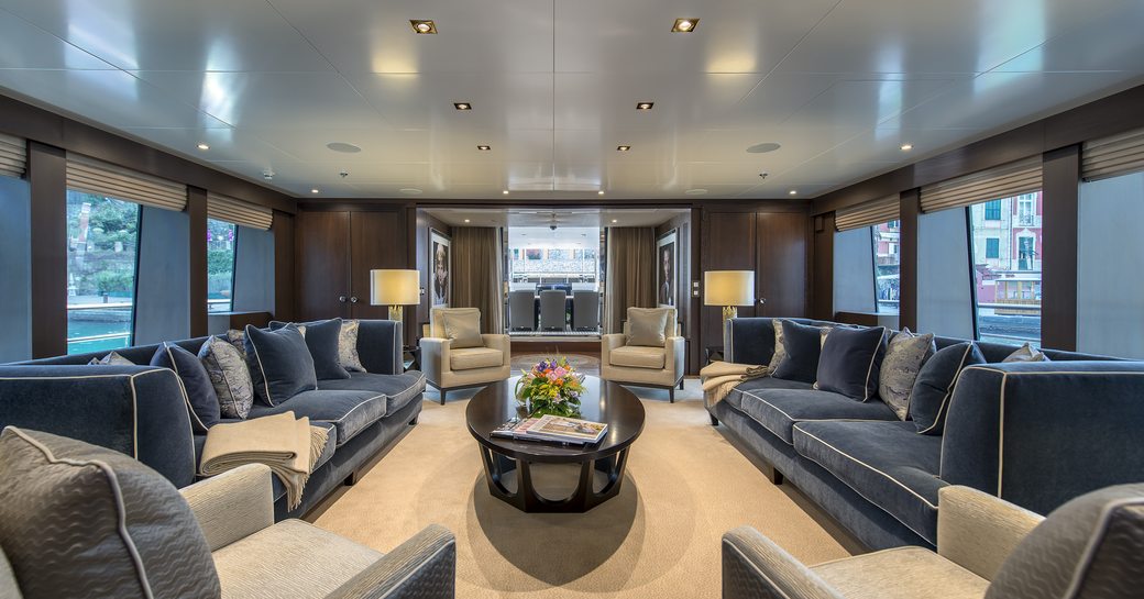 art deck inspired main salon with sociable lounge on board motor yacht ‘The Wellesley’
