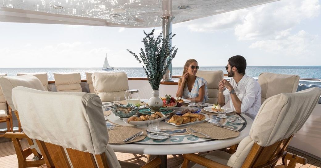 Alfresco dining on board superyacht TOUCH