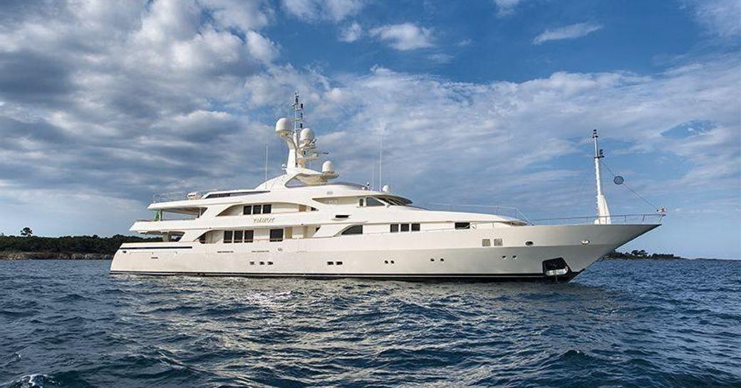 Benetti superyacht TOMMY sat at-anchor