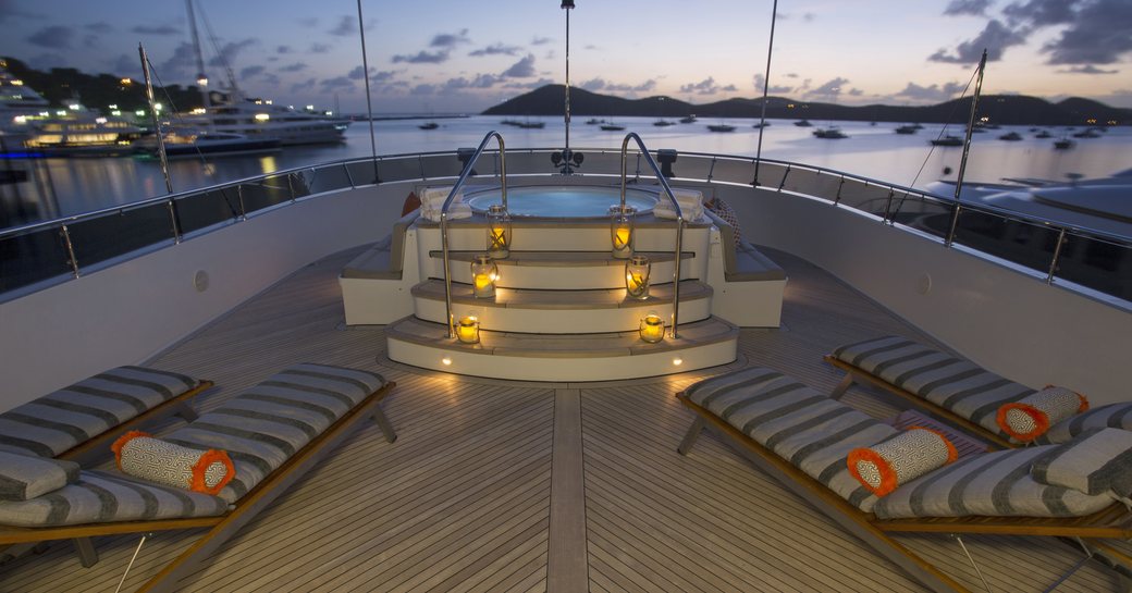 Jacuzzi and newly upholstered sun loungers on motor yacht bacchus