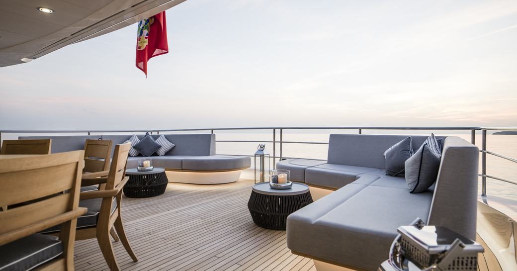 Spacious seating area on board Berco Voyager, luxury superyacht charter 