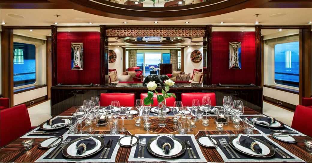 macassar ebony dining table in the main salon of motor yacht SLIPSTREAM