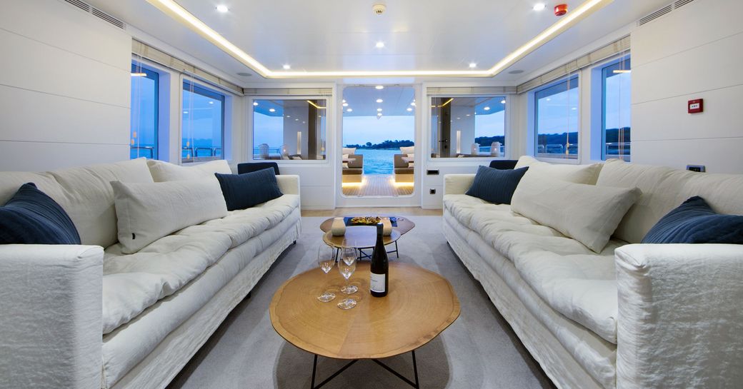 main salon lounge area on board luxury crewed yacht siempre