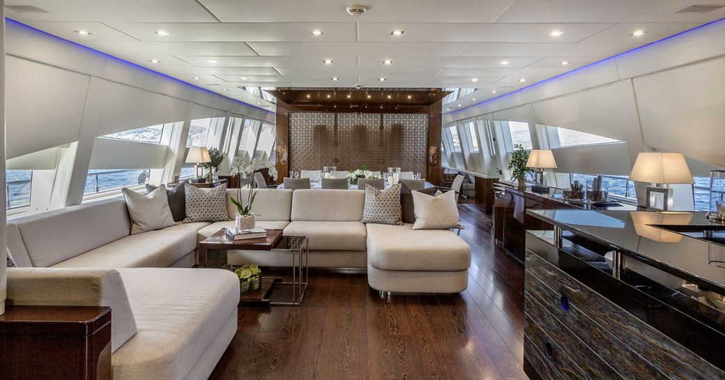 main salon with lounge and dining on board charter yacht 'My Toy'