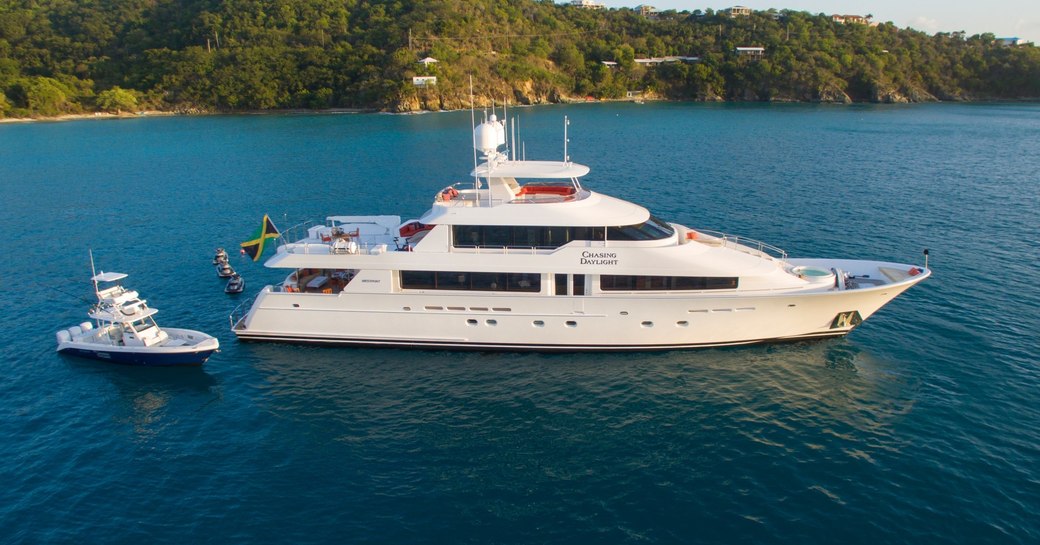 Chasing Daylight cruises on a luxury yacht charter in Costa Rica alongside chase tender