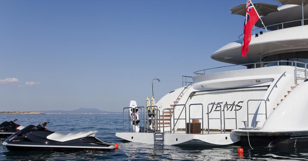 drop-down swim platform on board luxury yacht JEMS with water toys nearby