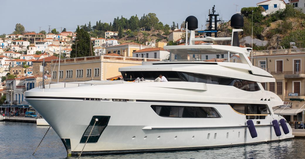 Motor yacht charter berthed in Poros Port, Greece