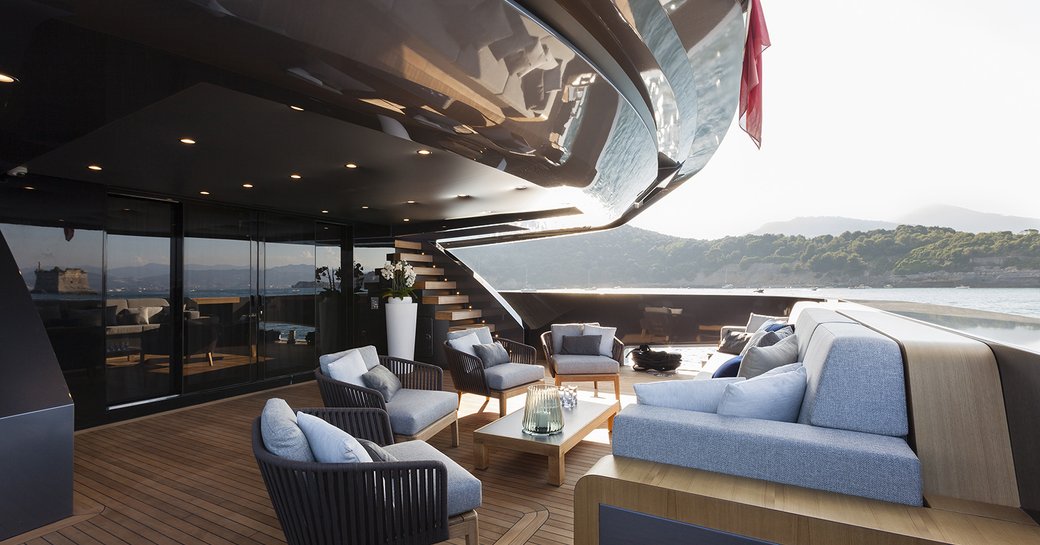 sumptuous seating on the main deck aft of superyacht ‘Lucky Me’ 