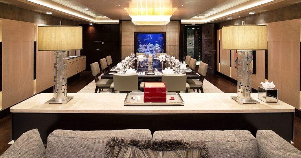 dining area and tropical fish tank on motor yacht VICKI